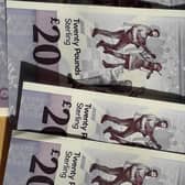 The annual gas bill of a typical household with a credit meter will be reduced by around £136. Image: National World