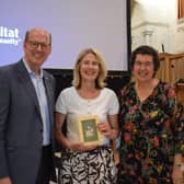 Jenny Hickland is presented with her ReStore Gold award. L-R: Jonathan Reckford, Habitat for Humanity International CEO, Jenny Hickland & Jenny Williams, Habitat Ireland, Chief Executive. Pic credit: Habitat for Humanity