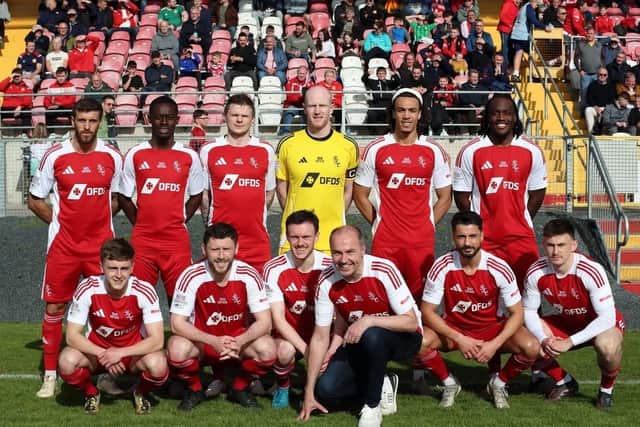 To mark their centenary in the Irish League, Portadown took to the field in a retro 1980’s kit, a throwback to the Day George Best played at Shamrock Park. Stuart McKinley was mascot that day and he recreated that role for the team photo.