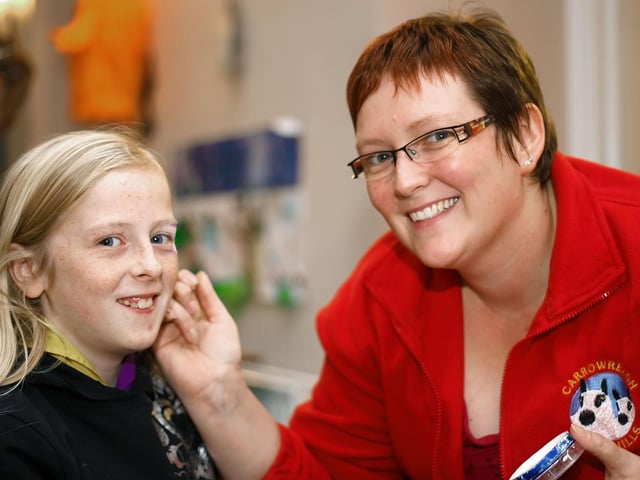 Krystle Mullin does face painting at Ballycastle Scouts Halloween Party in 2009.