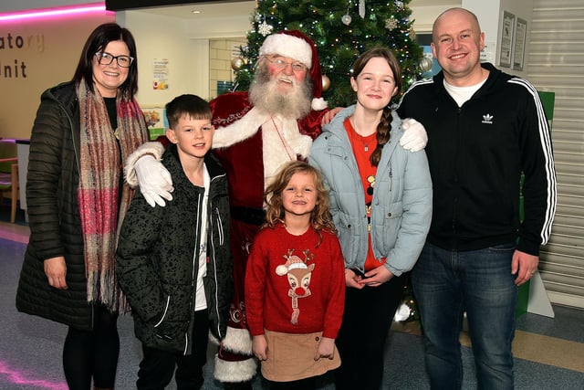 Santa pictured with the Downey family from Banbridge at Craigavon Area Hospital on Chritmas Eve.