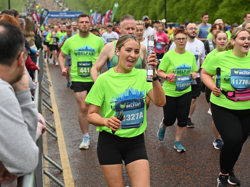 This runner is looking happy at the start of the race.
