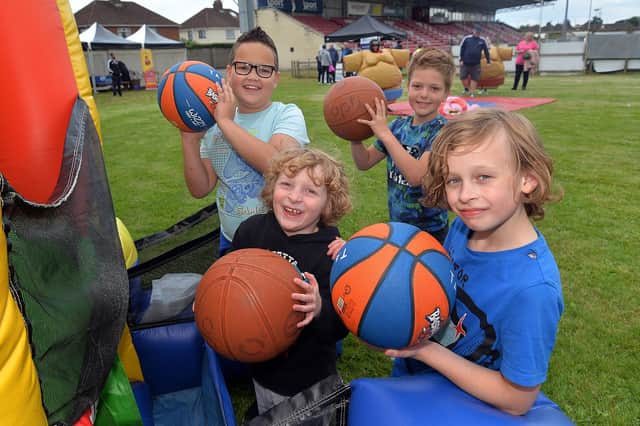 Having a go at the basketball game during the Portadown Football Club community fun night are, back row from left, Eli Capper (8) and Freddie Turner (8) and front, William Bloomer (6) and Michael Bloomer (9). PT30-202.