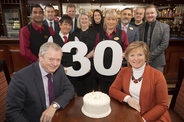 Staff and management celebrating the 30th anniversary at Corr's Corner Hotel. (Pic: Phil Smyth).