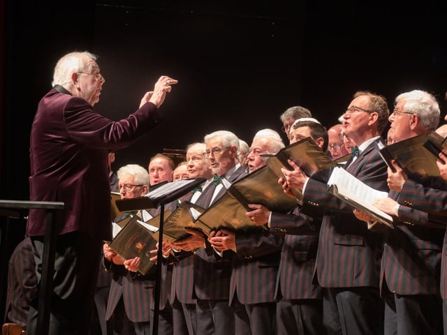 Choir conductor, Gordon Speers, BEM, in action at the Portadown Male Voice Choir concert. PT16-239.