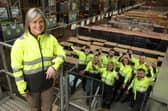 Maeve McCleane, Chief People Officer at Lidl Ireland and Northern Ireland and the warehouse team at Nutt’s Corner. Picture: Phil Smyth