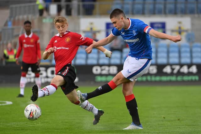 Rangers  Bailey Rice in action with Manchester United’s  Amir Ibragimov

Photo by  Stephen Hamilton/Presseye