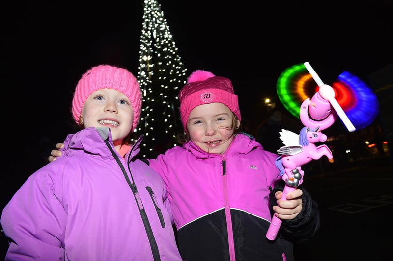 Aoivh McCaw and Shannon Lawless impressed by the lit up Crumlin Christmas tree.