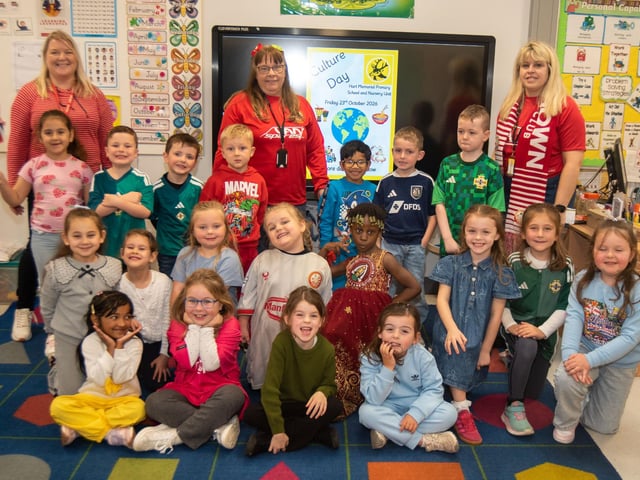 P2 pupils who took part in the school Culture Day event pictured with staff from left, Jenny McCoo, classroom assistant; Ruth Herron, sub teacher, and Judith Lee, P2 teacher.