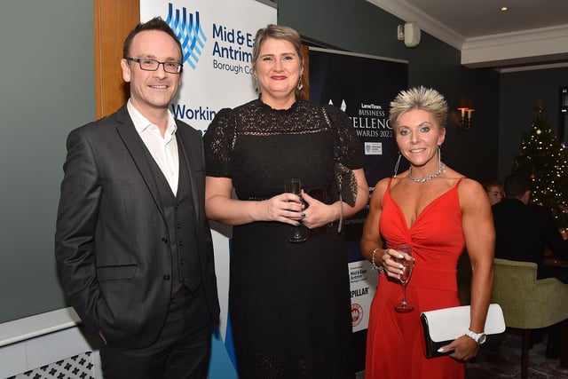 Posing for the camera at the business awards are from left, Liam Mulholland, Helen Reilly and Carol Withers. LT48-226.