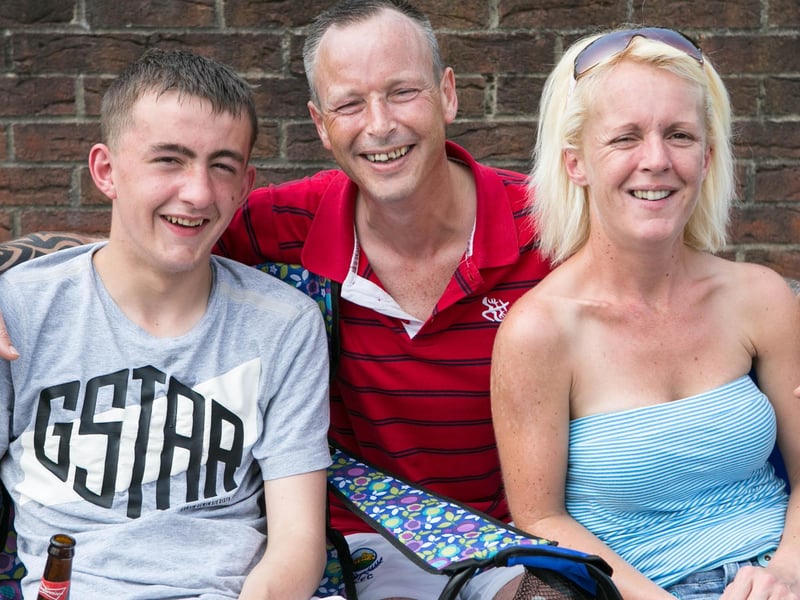 Marcus Thompson, Roy Cairns and Marcella Thompson from Carrick watching the parades. INCT 29-432-RM