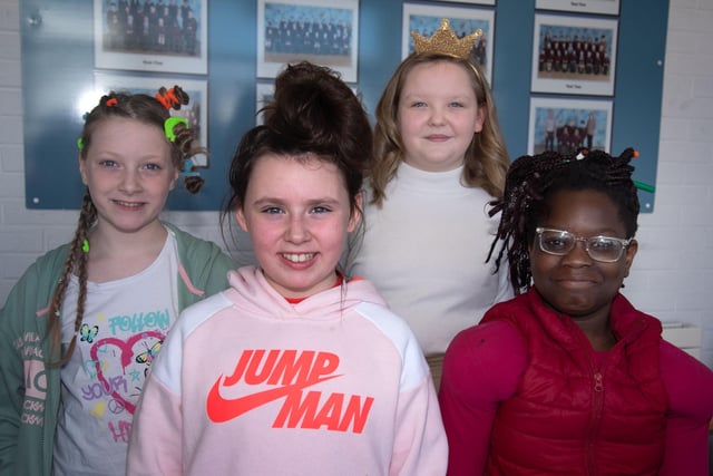 Funky Hair Friday was a great success raising around £4,000 for the Little Princess Trust. Pictured are Year 6 pupils who took part including from left, Jorgie, Connie-Maye, Emilija, who had 12 inches of her hair cut off, and Helena. PT12-249.