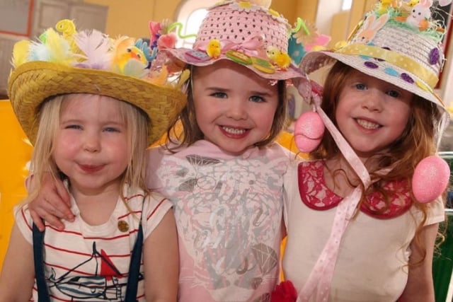 Darci-Leigh McFarland, Elsa McClean and Hollie-Rose Lee with their Easter bonnets for the big party in Mulberry Bush Playgroup in 2014.
