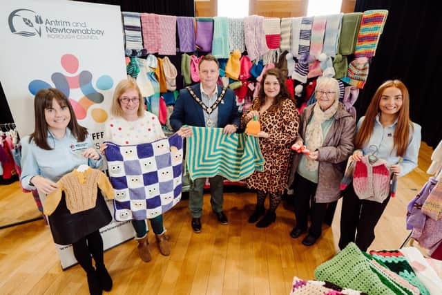Mayor and Council's Health and Wellbeing team present Baby Basics with some tiny knits. Picture: Antrim and Newtownabbey Borough Council