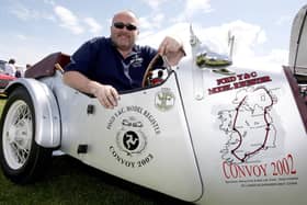 Paul Mullan pictured with his late father's 1937 Model Y Special during the Ford Fair at the Dunluce Centre in 2009