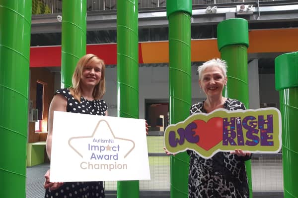 Christine Kearney, Autism NI presenting Marie Marin, Chief Executive Employers For Childcare with the Autism NI Impact Award on behalf of High Rise.
