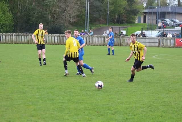 Seapatrick goalscorer Chris McGrath in the thick of the action at Havelock on Saturday.