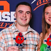 Ellie-Kate Hutchinson (right) with her award as Rookie of the Year at Syracuse University