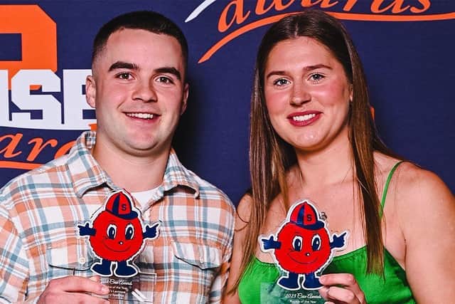 Ellie-Kate Hutchinson (right) with her award as Rookie of the Year at Syracuse University