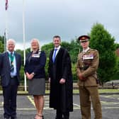 Pictured at the raising at the Armed Forces Flag at Lagan Valley Island are: Wing Commander Steve McCleery; Alderman Owen Gawith, Corporate Services Chairman; DL High Sheriff of Co Antrim Mr Peter Thomas Watts Mackie; Deputy Lord Lieutenant of County Antrim Mrs Pauline Shields OBE DL; Mr David Burns, Chief Executive of Lisburn & Castlereagh City Council and Lt Col Simon Whittaker. Pic Credit: LCCC