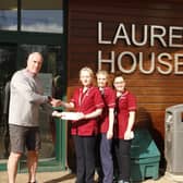 Michael Browne pictured presenting staff of Laurel House at Antrim Area Hospital with a cheque for £2,500 raised from the ARC Sailing Rally in November.