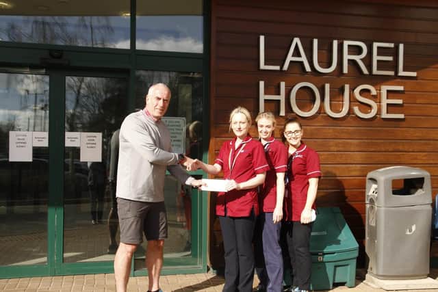 Michael Browne pictured presenting staff of Laurel House at Antrim Area Hospital with a cheque for £2,500 raised from the ARC Sailing Rally in November.