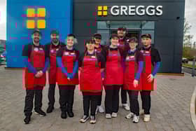 Steven Hodgen, left, manager at the new Greggs restaurant and drive thru in Craigavon with some of his staff. PT11-223.