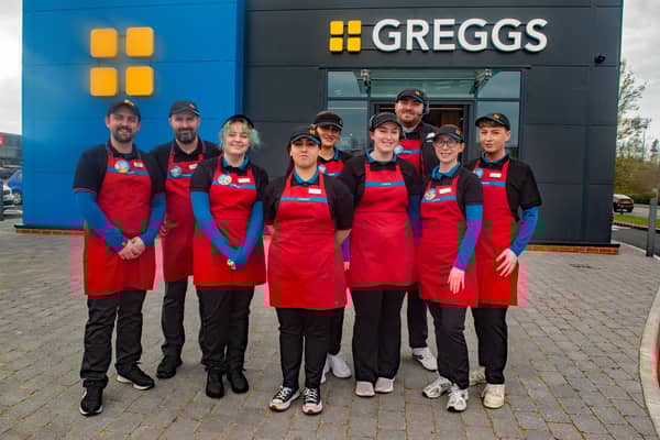 Steven Hodgen, left, manager at the new Greggs restaurant and drive thru in Craigavon with some of his staff. PT11-223.