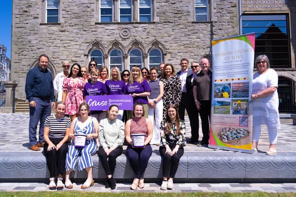 Directors and staff at PA Duffy & Co Solicitors pictured in Dungannon with representatives of the charities they will be supporting over the coming year.