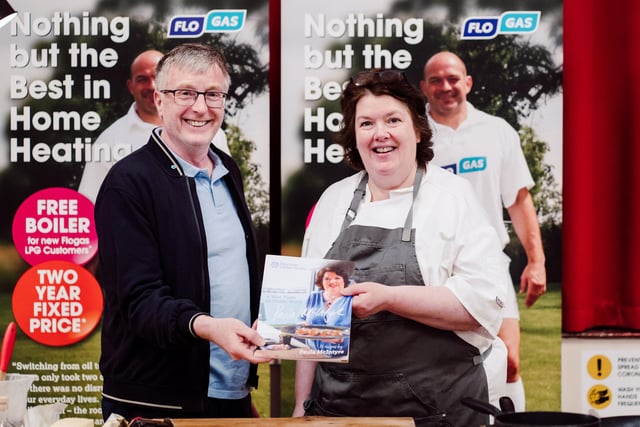 Chef Paula McIntyre with her Ulster-Scots recipe book during the cookery demonstration in Ballyclare.