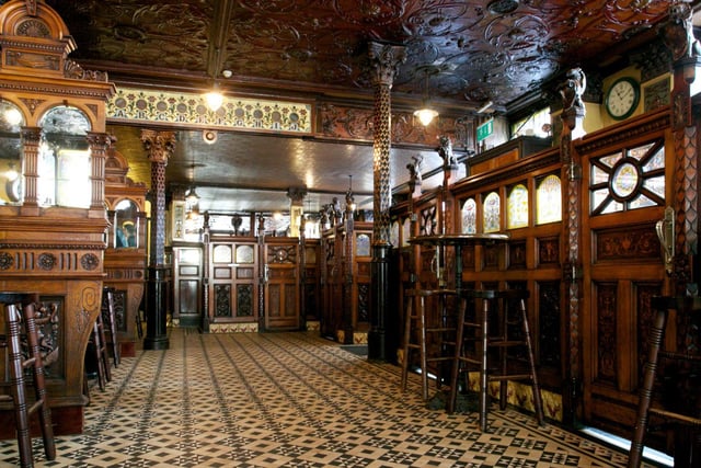 Previously known as The Crown Bar, this spot is very popular with tourists and has a history dating back to the 1800s. Visitors are encouraged to not get distracted by the traditional furnishings and Victorian style decor within the pub that was once regarded as one of the finest gin palaces of all time, it's important to keep an eye and ear out for ghostly goings-on. 
The building is said to house two unwanted residents, that of Micheal Flanagan who had renovated it in 1885 and a lady of the night, Amelia who mysteriously died after falling down the stairs with their forms being allegedly spotted in the bar and sights of Amelia taking place near the staircase she lost her life on.
