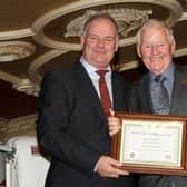 Pat Ryan, President of the Irish Boxing Association, makes a special presentation to Newry man Jackie Poucher for his life-long contribution to boxing.