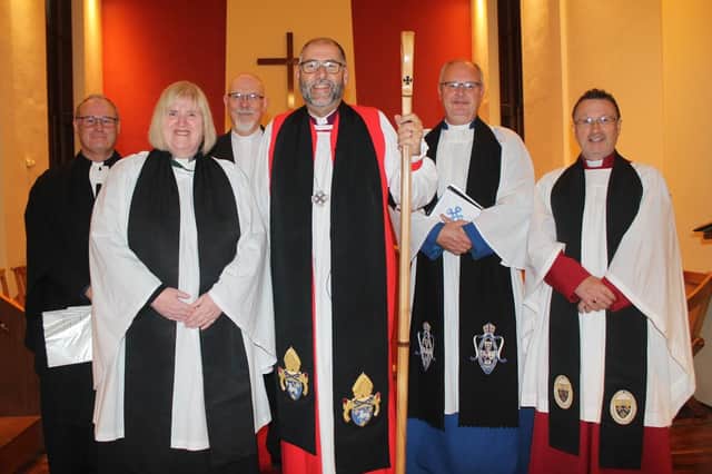 At the Service of Introduction in All Saints, Craigyhill, are, from left: The Rev Canon William Taggart, Registrar; the Rev Arlene Moore, new priest-in-charge of Kilwaughter and Cairncastle with All Saints, Craigyhill; the Rev Alan Lorimer, Methodist Church in Ireland, who preached; Bishop George Davison; the Rev Canon Mark Taylor, Rural Dean and the Ven Paul Dundas, Archdeacon of Dalriada.