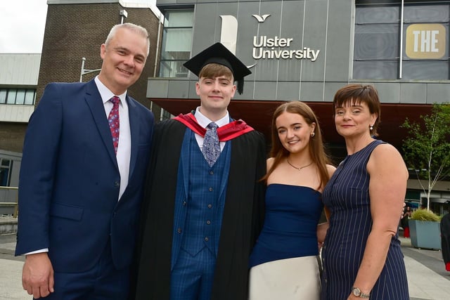 Pharmacy graduate Mark Tomany from Co.Monaghan celebrates at the Coleraine campus of Ulster University with mum Una, dad Barry and girlfriend Anna.