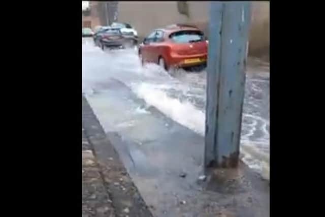 Still of video footage showing flooding on the Garvaghy Road, Portadown, Co Armagh
