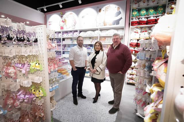 Owners of the MINISO franchise in Northern Ireland, Stuart Dixon and Trevor Finlay, pictured with senior relationship manager at Ulster Bank, Leona McNicholl. Picture: Kelvin Boyes / Press Eye