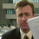 Stephen Grimason holding a copy of the Good Friday Agreement in April 1998. Picture: BBC