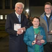 Christopher Smith and his eight-year-old daughter Meabh with Paul Clark MBE,  president of NI Hospice.