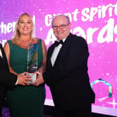 Stacey and Jamie Hamill, Dunamoy Cottages, winners of Tourism NI’s Best Self Catering (Large) category, are presented with their award by Frank McGonagle, Wholeschool.