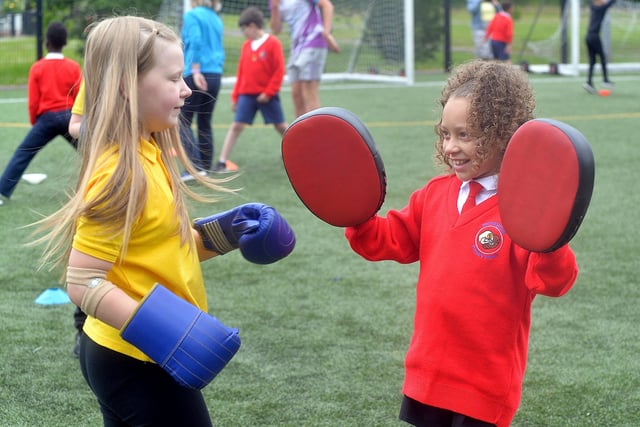 Hart and Presentation Primary School pupils getting some boxing experience at the joint fun day. PT24-206.
