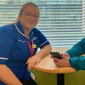 Julie Power discusses the My Care app with Deputy Staff Nurse Natalie Hoey. Pic credit: SEHSCT