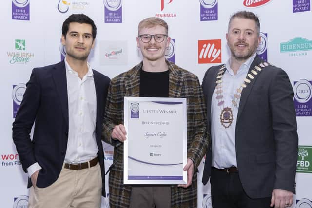Owner of Armagh’s Sojourn Coffee, Harry McNeely (centre), is presented with the Best Newcomer Award by the President of the Restaurants Association of Ireland, Paul Lenehan and a representative from Square.  Picture: Paul Sherwood.