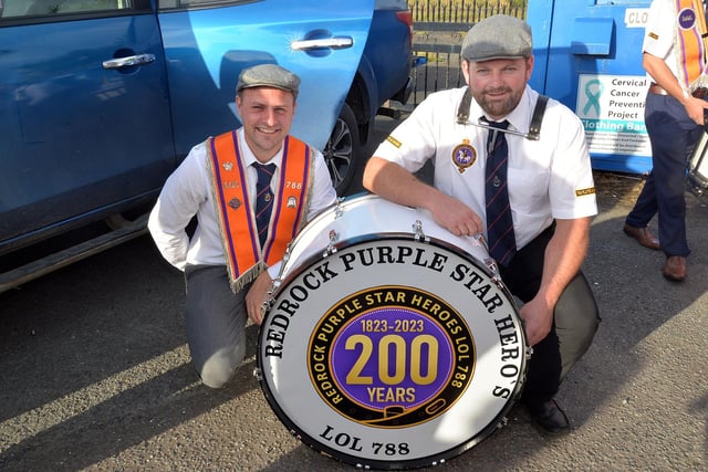 Adam Hawthorne, left, and Keith Woods of Redrock Purple Star Heroes LOL 788 pictured with their 200th anniversary drum before the mini 12th parade in Markethill. PT27-260.