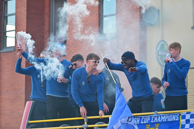 Irish Cup winners Dungannon Swifts enjoy a open top bus tour on Monday evening through the town.