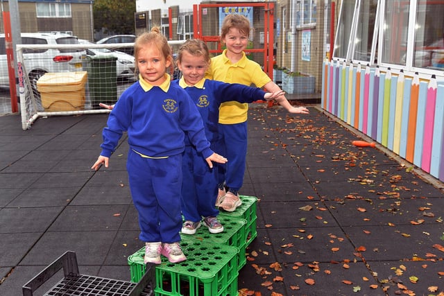 Tackling the outdoor obstacle course at Edenderry Nursery School  are pupils from left, Alice, Lucy and Anna. PT43-316.