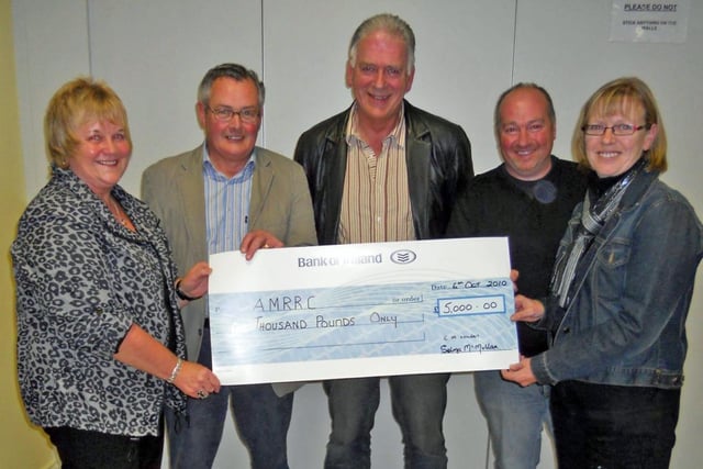 Pictured presenting a cheque for the grand total of £5,000 to members of Armoy Road Racing Club are Selma McMullan (left) and Ann Louden from the Armoy Road Racing Supporters Club back in 2010