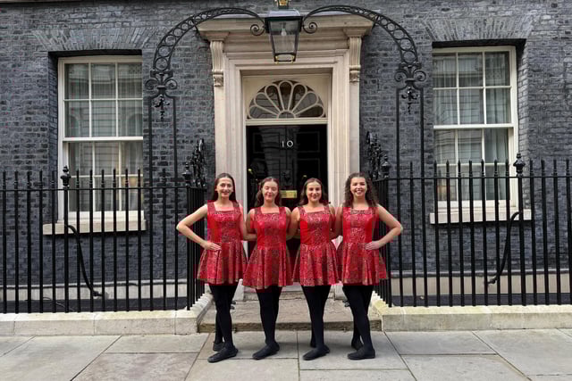 Innova dancers pictured outside the famous black door of No10 Downing Street.