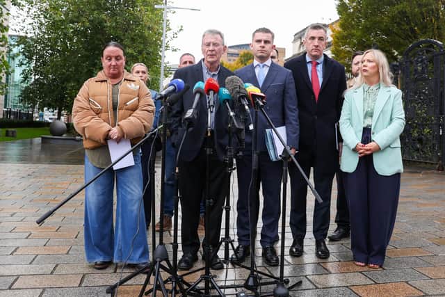 Garvaghy Road residents' spokesperson Breandán Mac Cionnaith leaves the court with other residents and his legal team. Picture by Jonathan Porter/PressEye