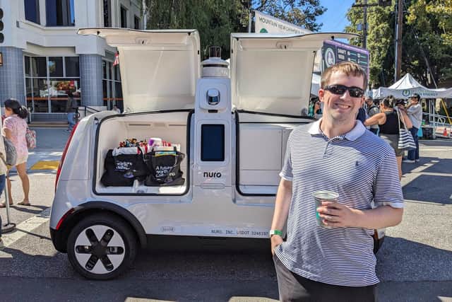 Conor McCaffrey enjoying food from a self-drive delivery van in San Francisco, California.