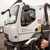 Cllr Billy Webb MBE at a council vehicle which was taking part in a vegetable oil trial. Photo submitted by Antrim and Newtownabbey Borough Council.